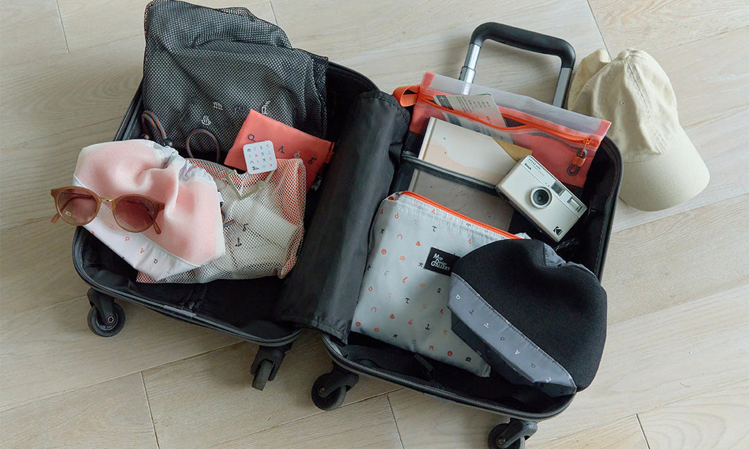 旅をもっと身軽に、もっと心地よく　地図記号デザインのトラベルアイテム